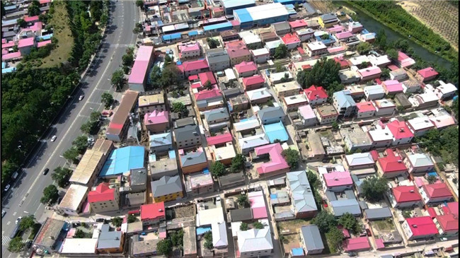 无人机拍摄村庄全景地图，加快自建房安全隐患排查速度。杨笑然 摄